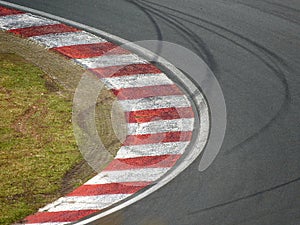 Circuit racing curb red and White formula1 formule1 racetrack racing tyre marks bend