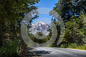 Circuito Chico hiking road with snowtopped Mountain on background - Bariloche, Patagonia, Argentina photo