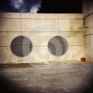 Circular Air Vents on exterior of building