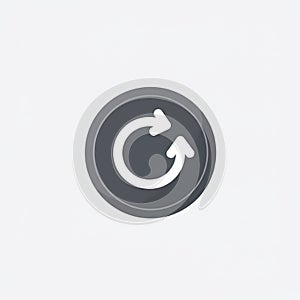 Circular arrow icon on gray button, symbolizing refresh or reload