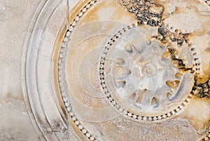 Circular bas-relief on marble photo