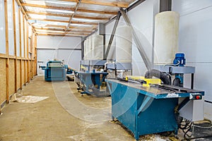 Circular blade saw machine tools in carpentry workshop