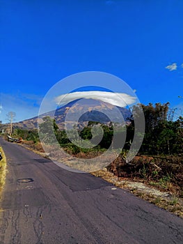 Circular Clouds Cover The Peak Of The Blue Mountain