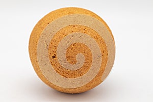 Circular Columbian Bunuelo with a White Background