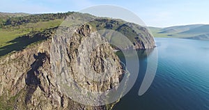 Circular flight over the rocky cliff of Baikal