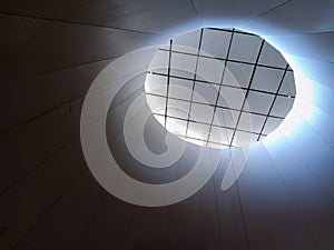 Circular lighted ceiling design of a modern building