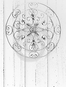 Circular metal ornate medallion grayscale