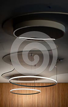 Circular pendant lights hanging from the ceiling