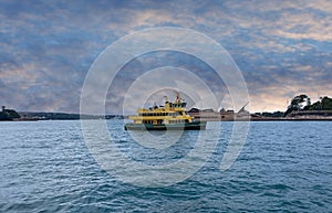 Circular Quay and Sydney Rocks Ferry on Sydney Harbour NSW Australia. Lovely colours of the Sky and water