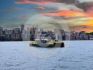 Circular Quay and Sydney Rocks Ferry on Sydney Harbour NSW Australia. Lovely colours of the Sky and water