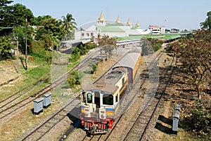 Circular Railway Train leaves Yangon Central Railway Station in