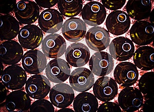 Circular rows of brown color bottles