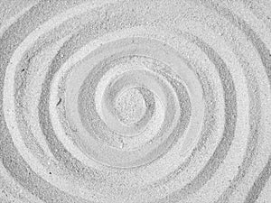 A circular sand swirl background texture abstract