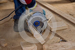 Circular saw carpenter using for wood beam