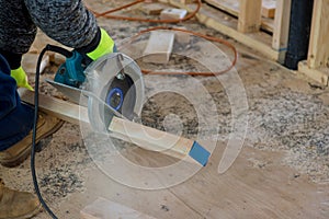 Circular saw carpenter using for wood beam