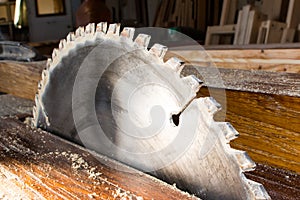 Circular saw in carpenter workshop