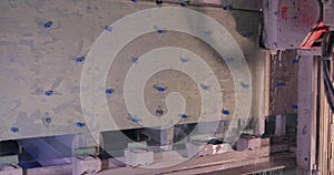 Circular saw cuts laminated glass. Saw cuts the multilayered glass. special production machine divides the form of the