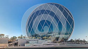 Circular skyscraper Aldar Headquarters Building timelapse in Abu Dhabi, UAE.