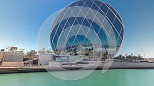 Circular skyscraper Aldar Headquarters Building timelapse in Abu Dhabi, UAE.