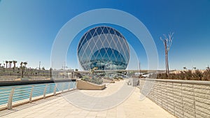 Circular skyscraper Aldar Headquarters Building timelapse hyperlapse in Abu Dhabi, UAE.