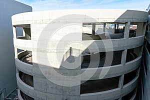 Circular, spiral parking garage ramp at multi story parking garage