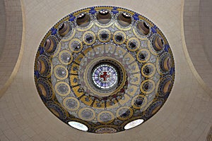 Circular stained glass windows & detail of dome surmounting the Rosary Basilica at the Sanctuary of Our Lady of Lourdes photo