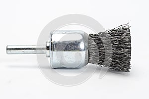 Circular steel wire brush for drill machine on white background