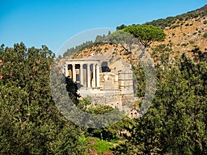 Circular Temple or Vesta on the banks of the river Aniene in Tivoli, Italy photo