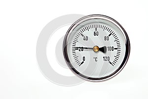 A circular thermometer.