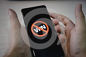 circumvention of sanctions is concept. Ban on the use of VPN on a smartphone photo