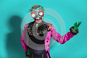 Circus actor in zombie suit posing on studio