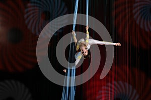 Circus artist acrobat performance on canvases.