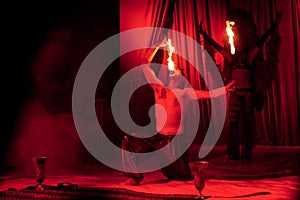 Circus artist swallowing flames