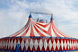 Circus tent against the blue sky