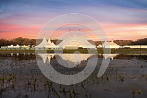 Circus tent on magical sky, sunset or sunrise