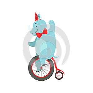 Circus Trained Rhinoceros Animal In Party Hat And Bow Tie Artist Performing Riding Vintage Bicycle Stunt For The Circus