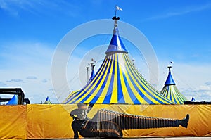 Cirque du Soleil yellow and blue tent