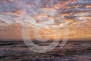 The Cirrocumulus Cloud over the sea on blue sky background before sunset. Beautiful clouds over the sea in sunset