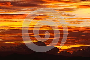 Cirrus clouds orange yellow sunset photo