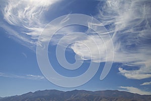 Cirrus cloudscape with tropical deep blue sky