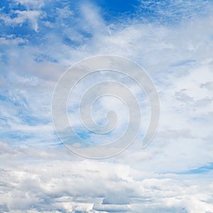 Cirrus and cumuli white clouds in blue sky