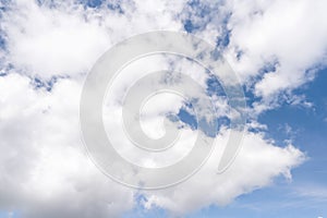 cirrus, feathery clouds against spring bright blue cloudy sky on sunny day in England