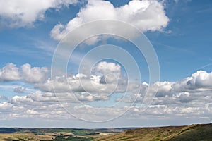 cirrus, feathery clouds against spring bright blue cloudy sky on sunny day in England