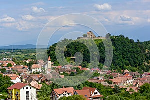 Cisnadioara village with his medieval fortress on the hill, near Sibiu city, Transylvania, Romania