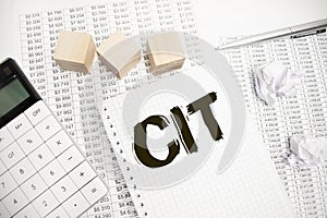 cit, corporate, income, tax, written in notebook on the white background photo