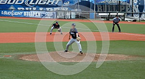 Citadal Pitcher fires a ball towards homeplate