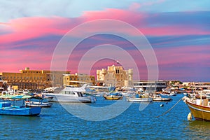 Citadel of Qaitbay, famous fort in the Mediterranean harbour of Alexandria, beautiful sunset view, Egypt