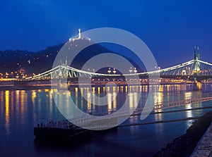Citadella and Liberty Bridge in Budapest at night.