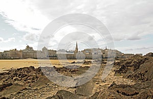 Cited of St Malo under a cloudy sky Brittany, France.