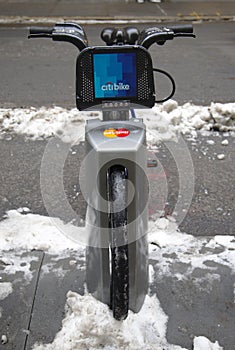 Citi bike under snow near Times Square in Manhattan